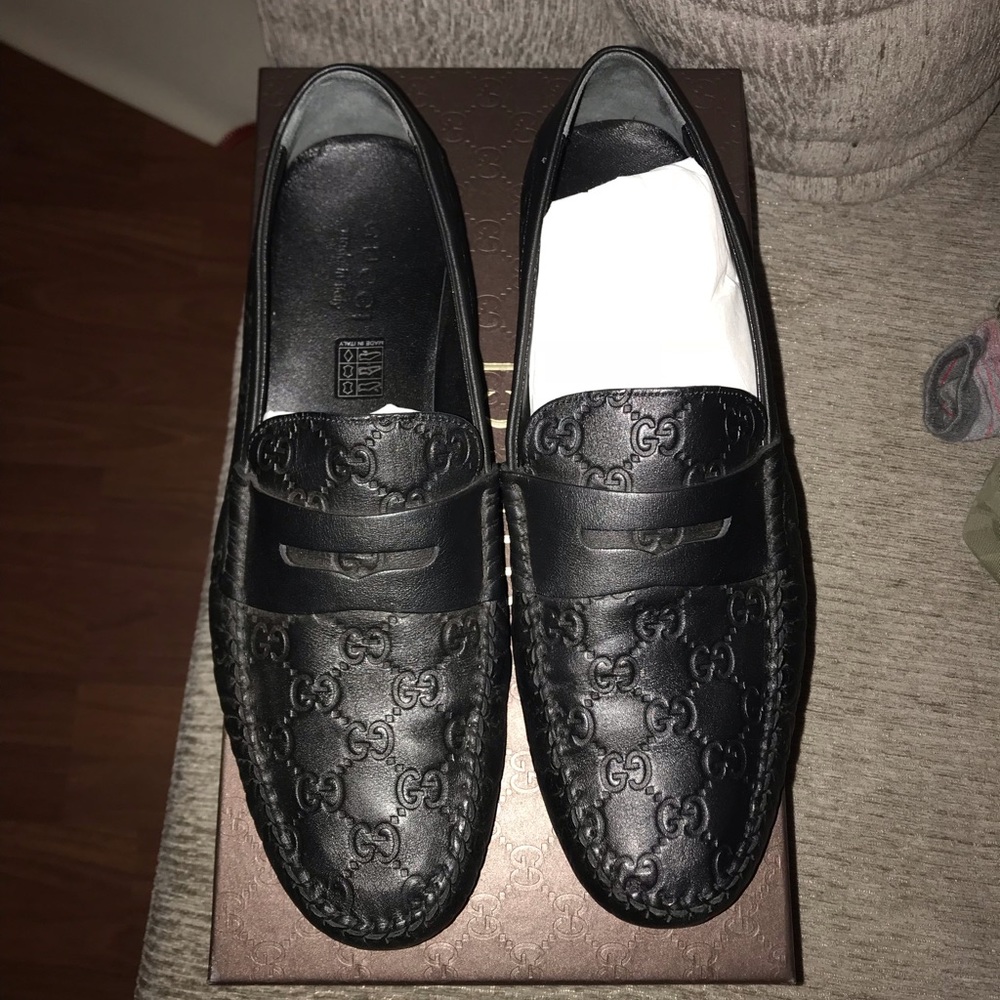 Size 10 Gucci dress shoes.